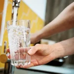 1800ss_getty_rf_pouring_glass_of_water.webp.webp
